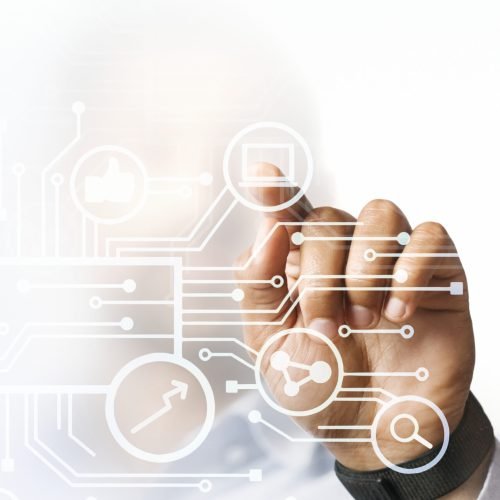 Businessman pointing at his business presentation on the high technology digital screen